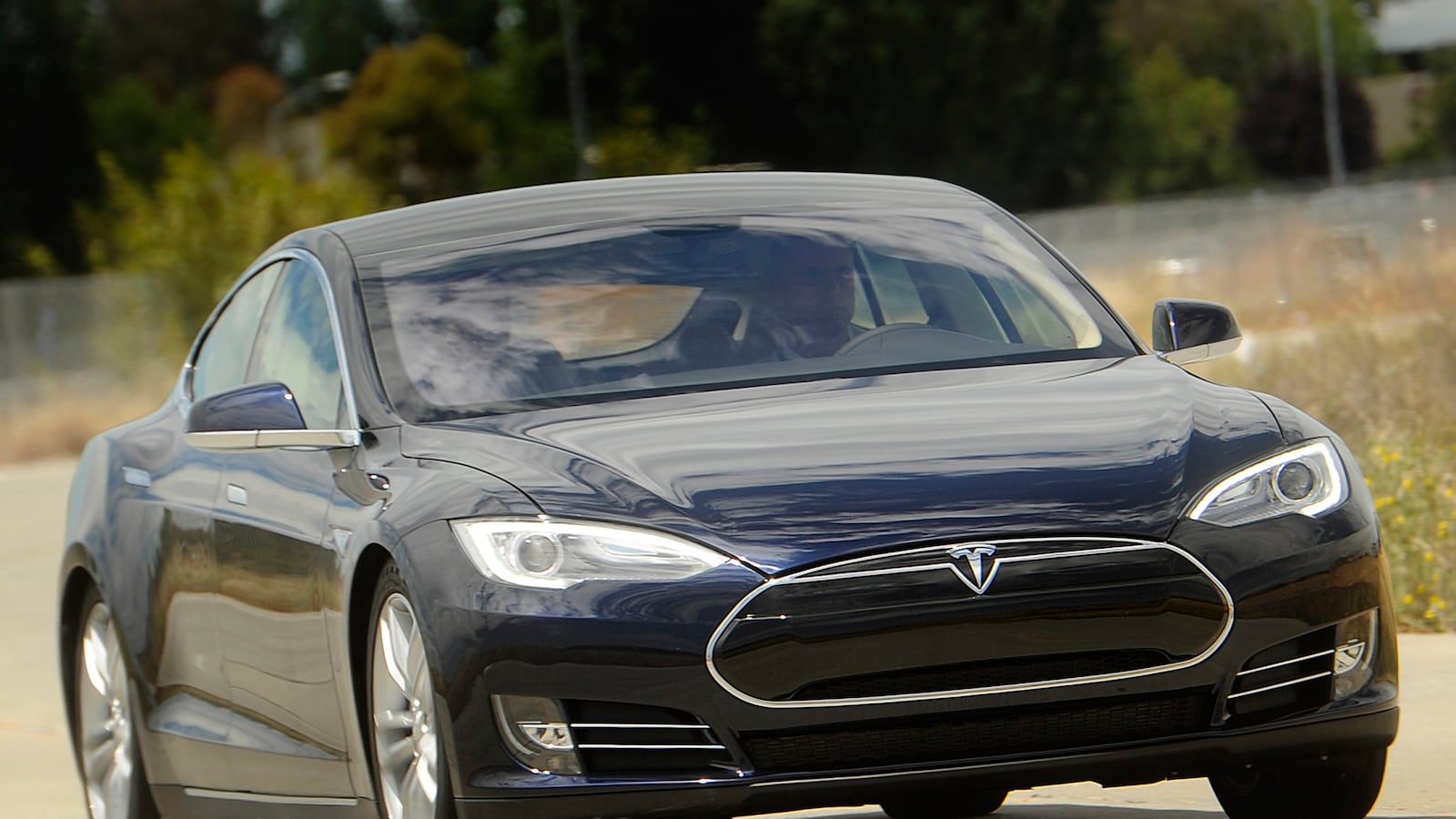 articles/2013/07/09/tesla-stock-added-to-nasdaq-100-index/130709-gross-tesla-tease_lmphwm