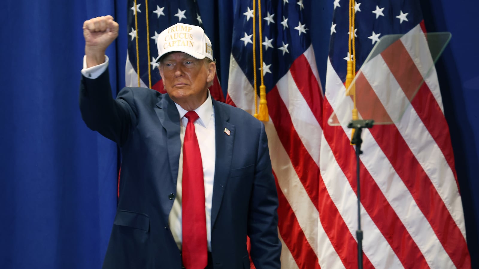 Donald Trump leaves a rally in Iowa.