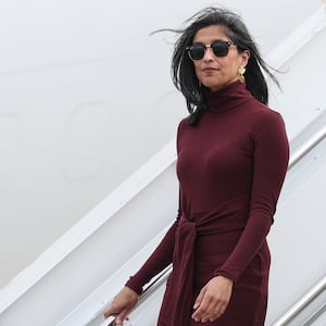 RICHLANDS, NORTH CAROLINA - NOVEMBER 19: Second lady Usha Vance (L) and first lady Melania Trump depart a plane as they arrive at Albert J. Ellis Airport en route to Camp Lejeune on November 19, 2025 in Richlands, North Carolina. Trump and Vance are traveling together for the day to visit military families and schools at Marine Corps Base Camp Lejeune. (Photo by Anna Moneymaker/Getty Images)