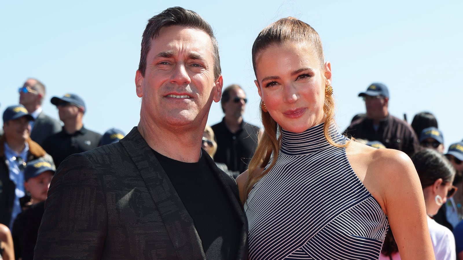 Jon Hamm and Anna Osceola attend the global premiere for the film Top Gun: Maverick.