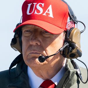 TOPSHOT - US President Donald Trump visits the USS George H.W. Bush aircraft carrier which is out at sea near Norfolk, Virginia, October 5, 2025, as he travels to see a Naval demonstration as part of the US Navy's 250th anniversary celebration, "America's Navy 250: Titans of the Sea - A Salute to the Fleet". (Photo by SAUL LOEB / AFP) (Photo by SAUL LOEB/AFP via Getty Images)
