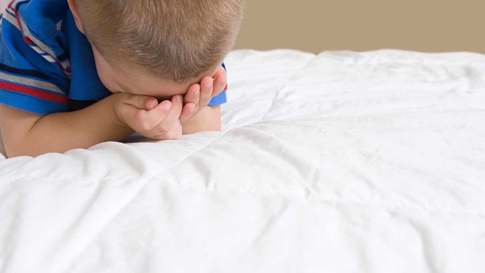 articles/2013/06/10/redefining-childhood-trauma/130610-child-abuse-tease_vez2jz