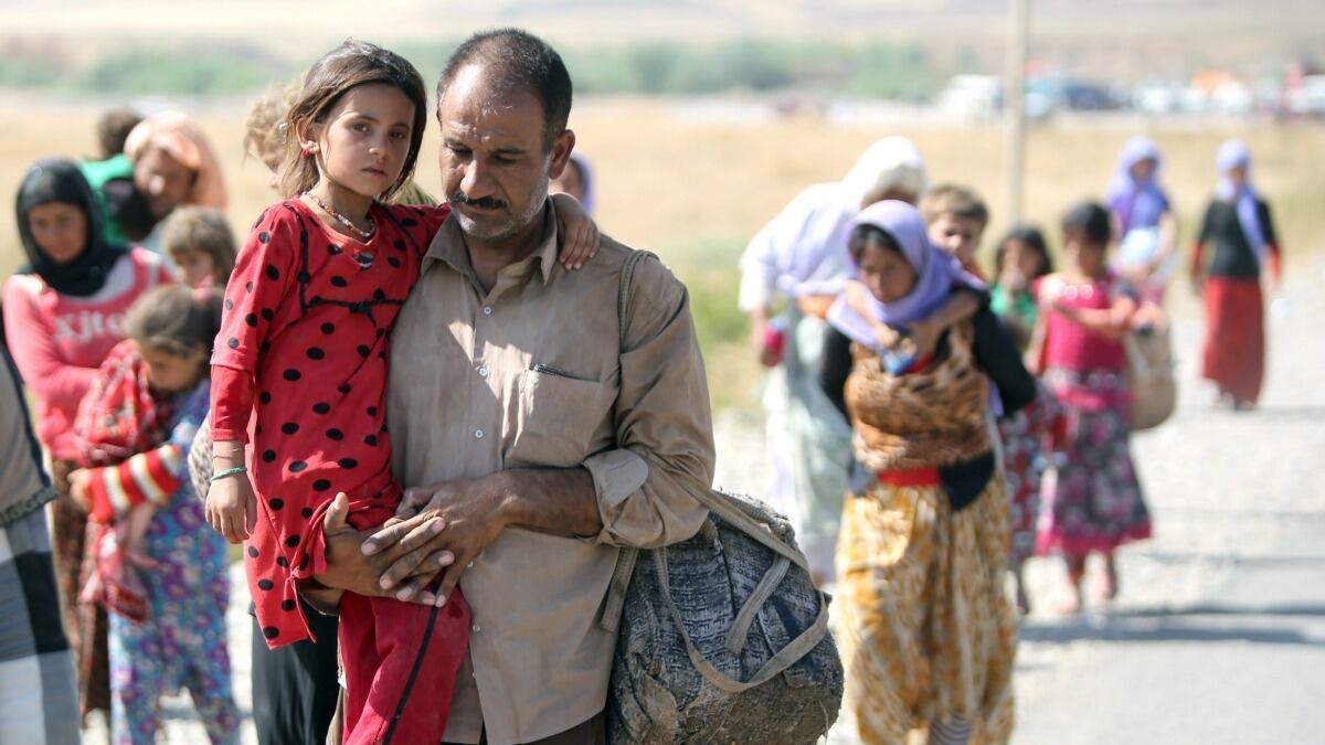 cheats/2014/08/11/heroic-iraqi-flights-rescue-yazidis/140811-isis-rescue_r86vy7