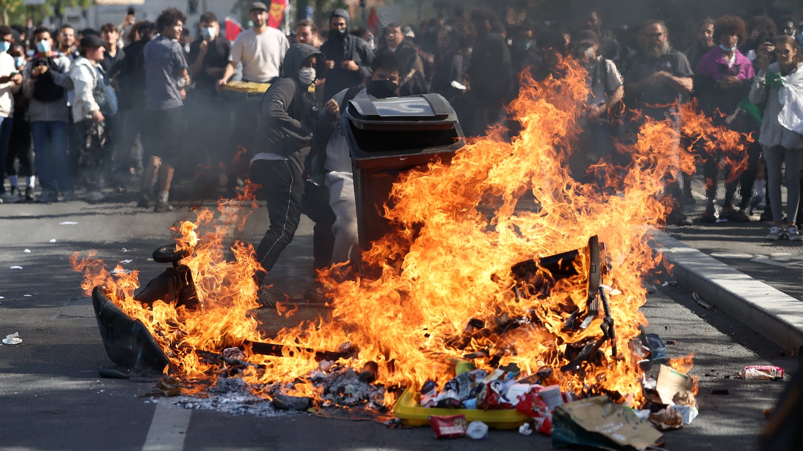AUBERVILLIERS, FRANCE - OCTOBER 1: French students set fires as they clash with police during a march through the streets of Aubervilliers, on October 1, 2026 in Aubervilliers, a northern suburb of Paris, France. In a wave of demonstrations that began around Paris last week and spread across France, secondary students have blockaded schools in protest against overcrowded classrooms, teacher shortages, and long class schedules. According to French Interior Minister Laurent Nunez, more than 400 have been detained, many of them minors, as some protests turned violent where students and police clashed. (Photo by Tom Nicholson/Getty Images)