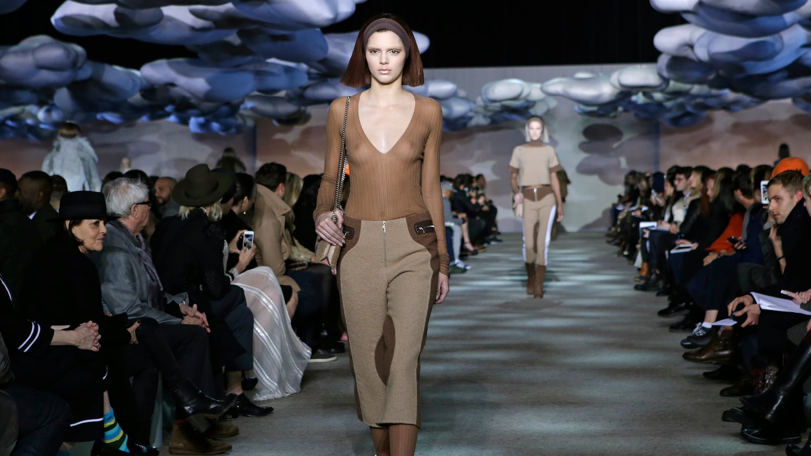 articles/2014/02/14/kendall-jenner-bares-breast-for-marc-jacobs-raf-simons-previews-home-goods-collection/149213-kendall-jenner-cheat_azy89g