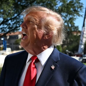 President Donald Trump speaks to the press before walking to board Marine One on the South Lawn of the White House in Washington, DC, on October 6, 2026.