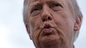 Donald Trump puckering his lips.