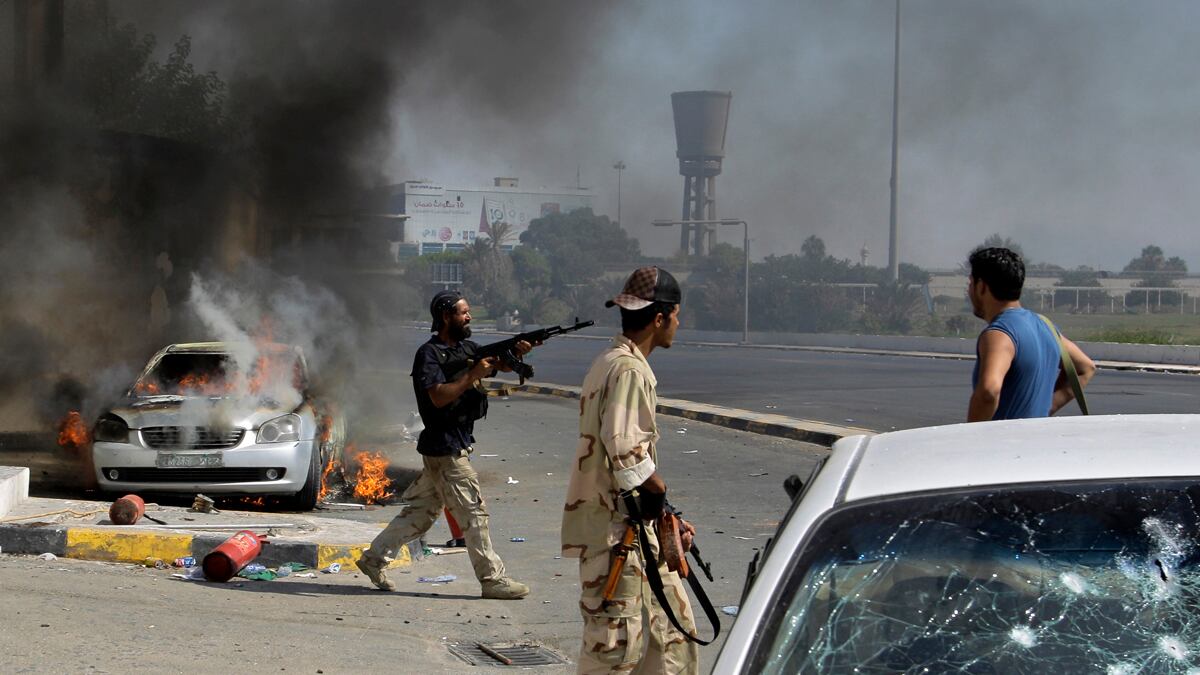 cheats/2011/08/23/rebels-hit-gaddafi-compound-report/libya-war-not-over-box_zgjgbm