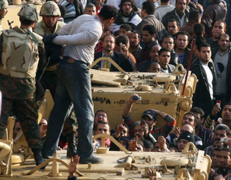 articles/2011/02/02/egypt-revolt-the-violent-scene-in-tahrir-square/dehghanpisheh-egypt-update_157520_dc8ulc