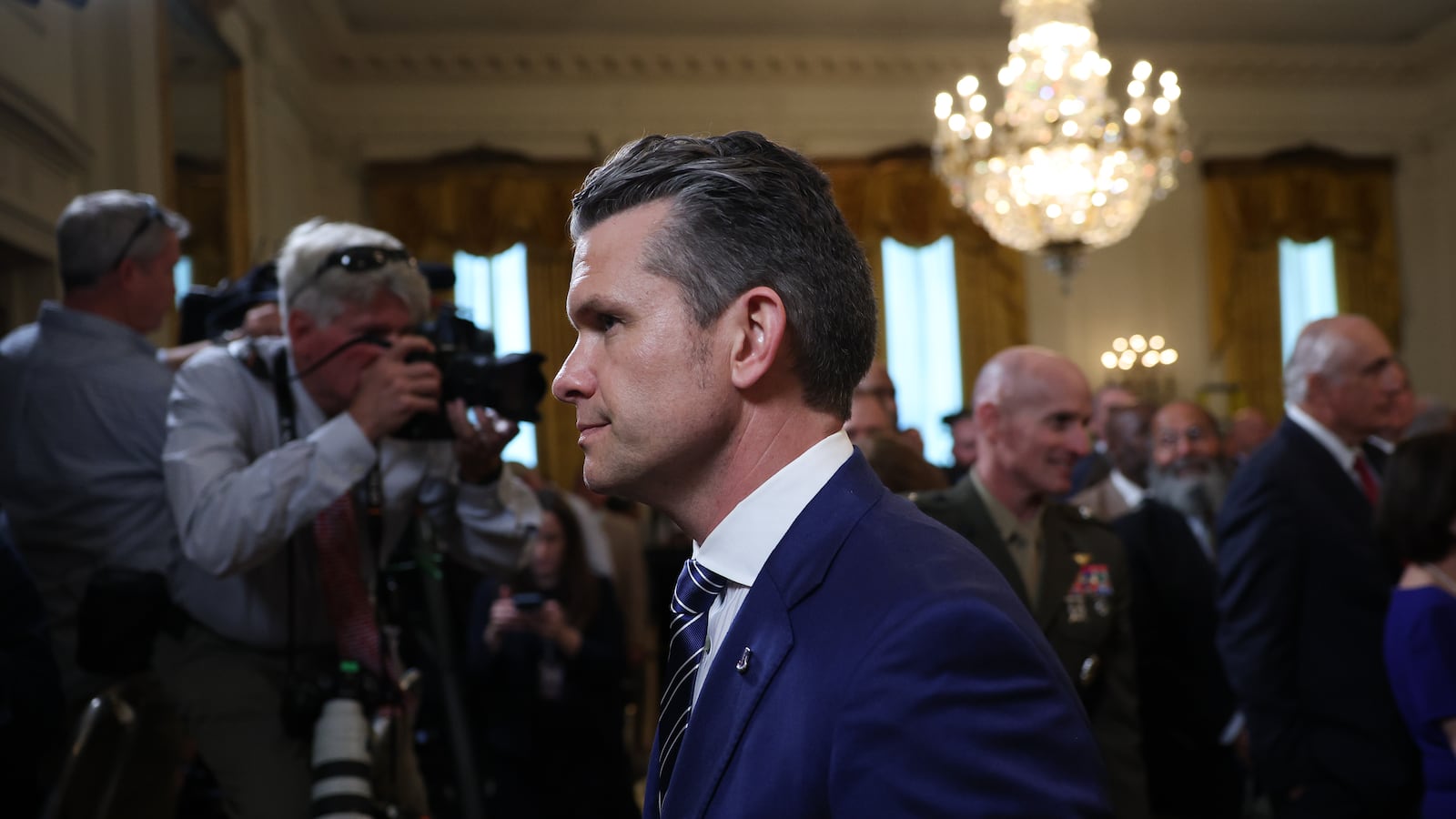 Defense Secretary Pete Hegseth departs a presentation ceremony for the Commander-in-Chief Trophy to the U.S. Naval Academy Midshipmen football team in the East Room of the White House April 15, 2025 in Washington, D.C.