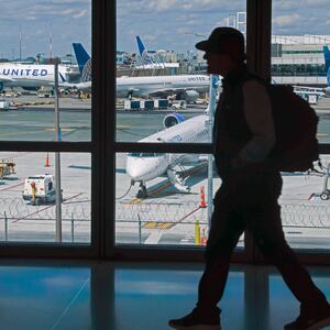 People move through Newark Liberty International Airport.