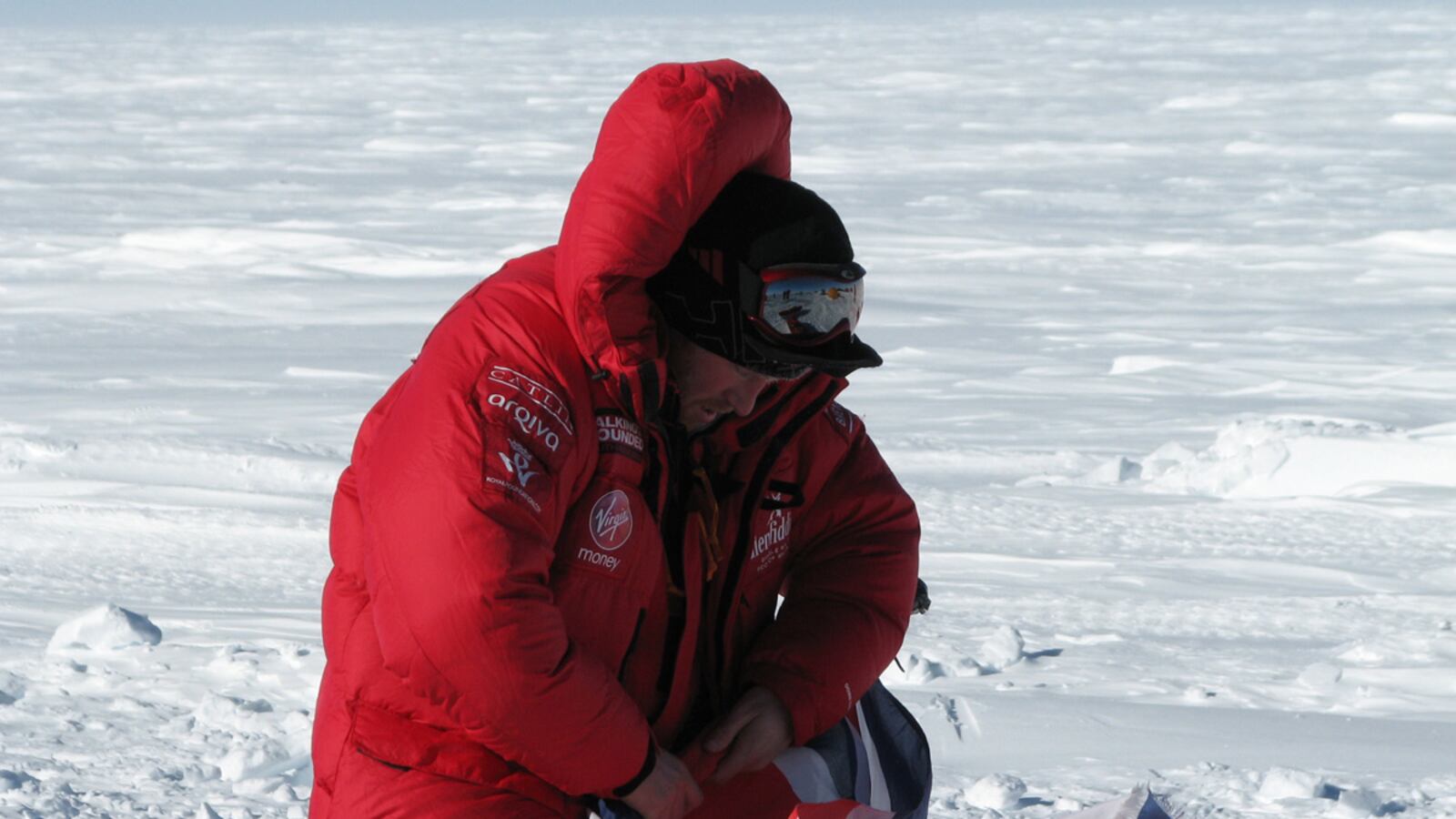 articles/2013/12/03/blue-skies-as-harry-and-the-team-begin-their-epic-walk/Harry-flag_tzbj9q