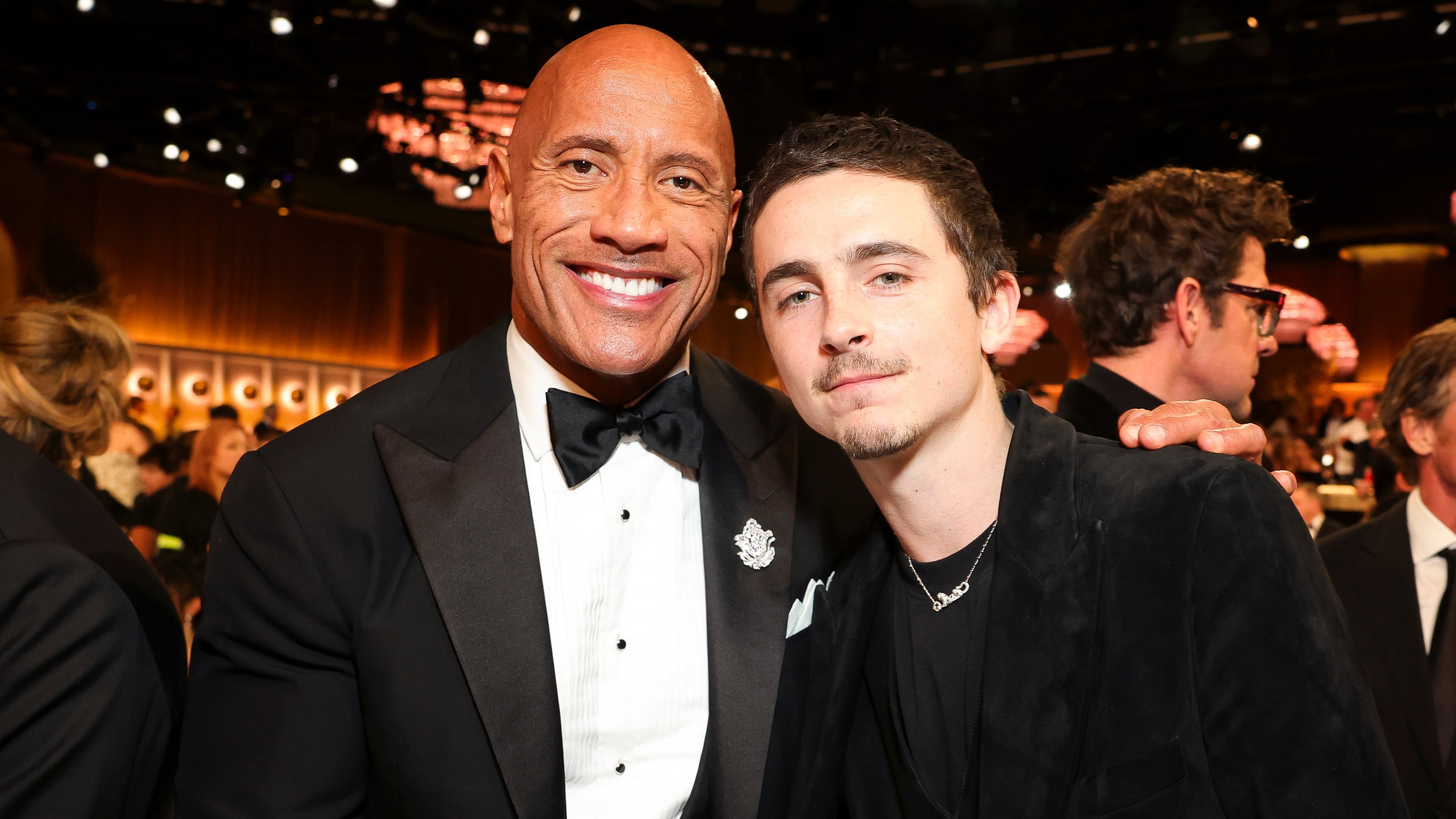 Dwayne Johnson and Timothée Chalamet attend the 83rd Annual Golden Globe Awards