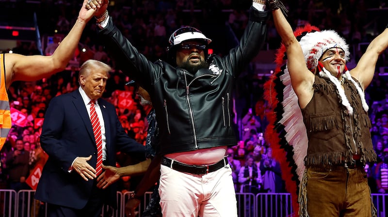 WASHINGTON, DC - JANUARY 19: President-Elect Donald Trump greets the Village People on stage at his victory rally at the Capital One Arena on January 19, 2025 in Washington, DC. Trump will be sworn in as the 47th U.S. president on January 20. (Photo by Anna Moneymaker/Getty Images)