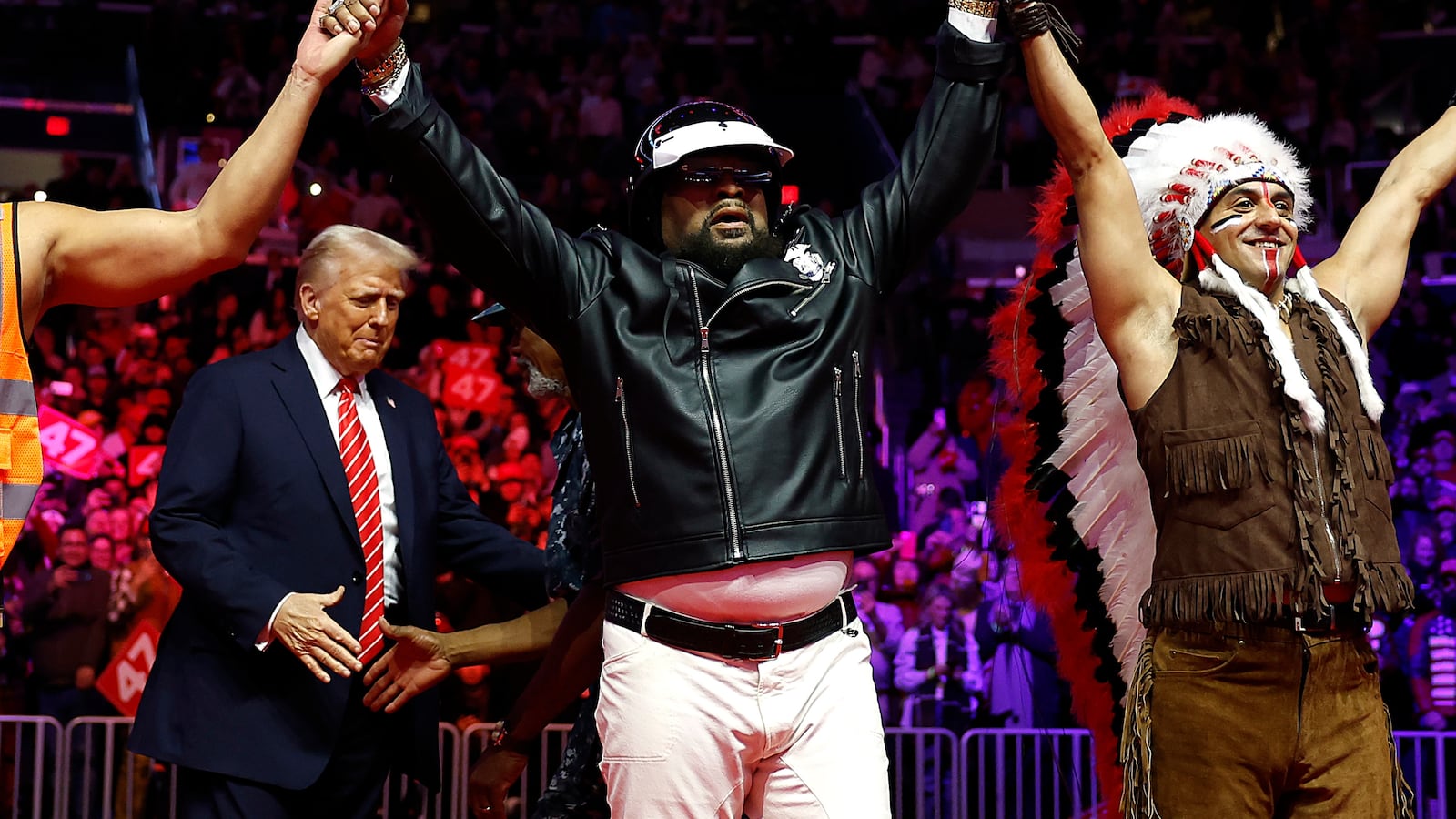 WASHINGTON, DC - JANUARY 19: President-Elect Donald Trump greets the Village People on stage at his victory rally at the Capital One Arena on January 19, 2025 in Washington, DC. Trump will be sworn in as the 47th U.S. president on January 20. (Photo by Anna Moneymaker/Getty Images)
