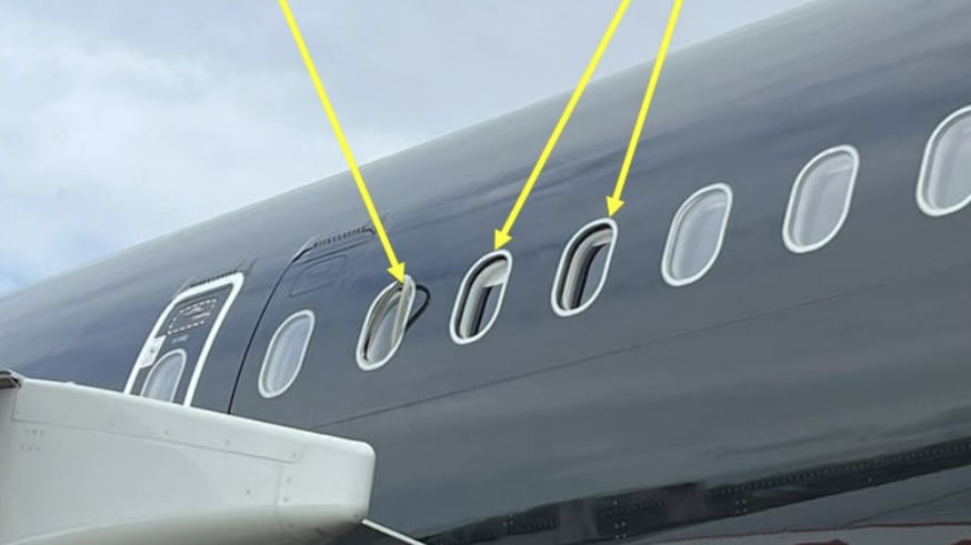 Damaged windowpanes highlighted on an aircraft that was forced to turn back to the U.K. on a flight to the U.S.