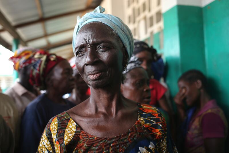 galleries/2014/10/23/portrait-of-an-epidemic-the-front-lines-of-ebola/141022-john-moore-ebola-11_to6tu6