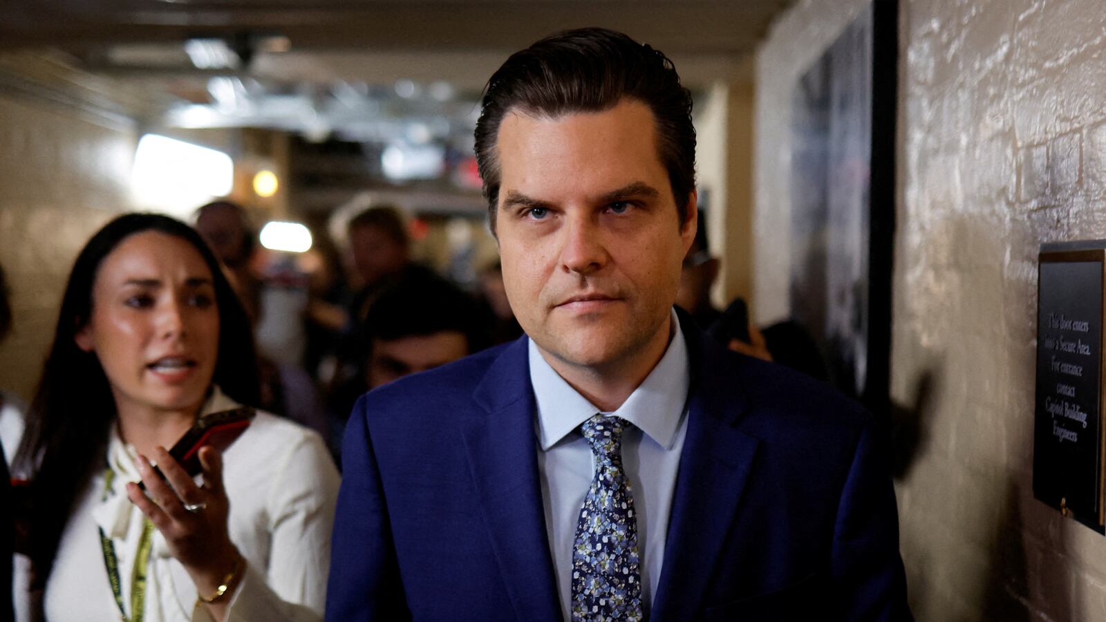 Matt Gaetz (R-FL) is trailed by reporters after a House Republican conference meeting