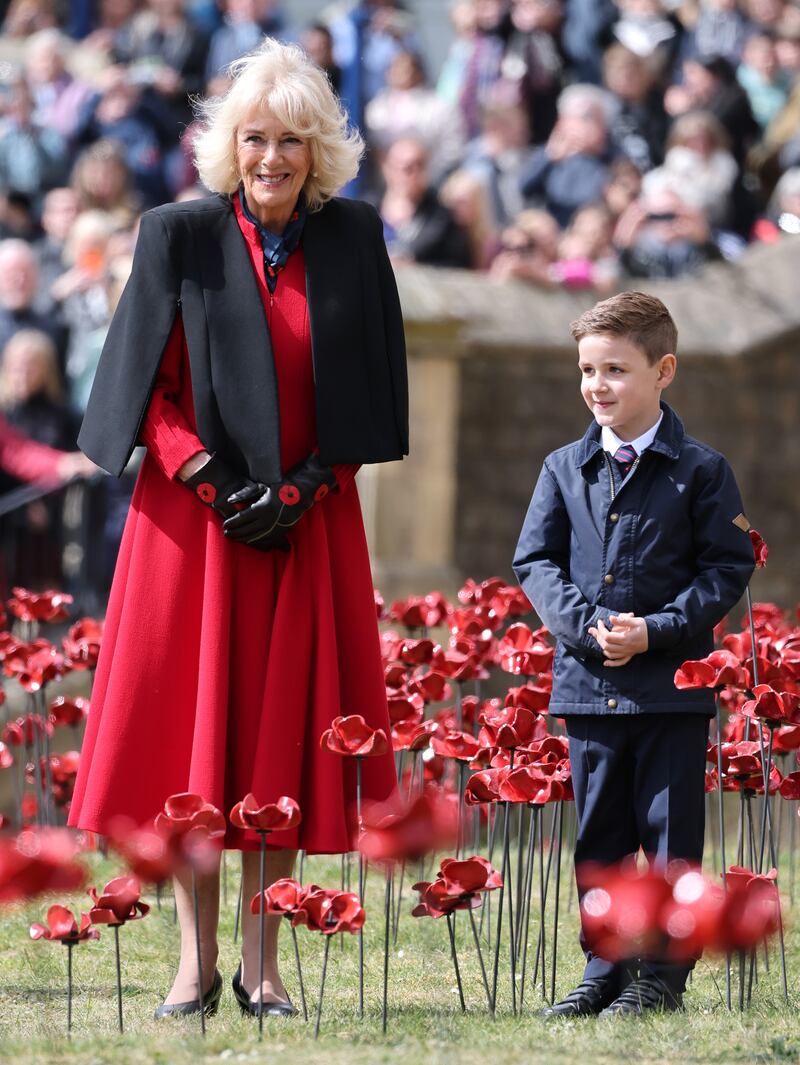Queen Camilla visits the new display of ceramic poppies, called The Tower Remembers, at the Tower of London on May 06, 2025
