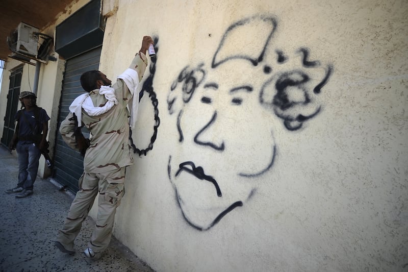 galleries/2011/08/21/libya-rebels-take-tripoli-capture-gaddafi-sons-photos/libyan-rebels2_wygrj1