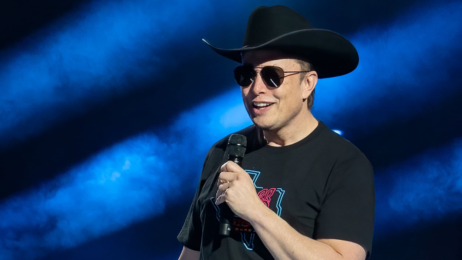 Elon Musk wearing a cowboy hat.