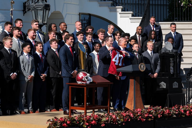 Trump received a team jersey from head football coach at Indiana University, Curt Cignetti. The CFP trophy stayed in one piece this year.
