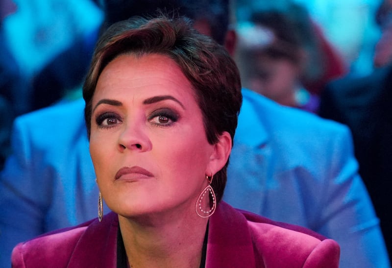 Kari Lake, U.S. President-elect Donald Trump's nominee for director of Voice of America, attends Turning Point USA's AmericaFest in Phoenix, Arizona, U.S., December 22, 2024.  REUTERS/Cheney Orr