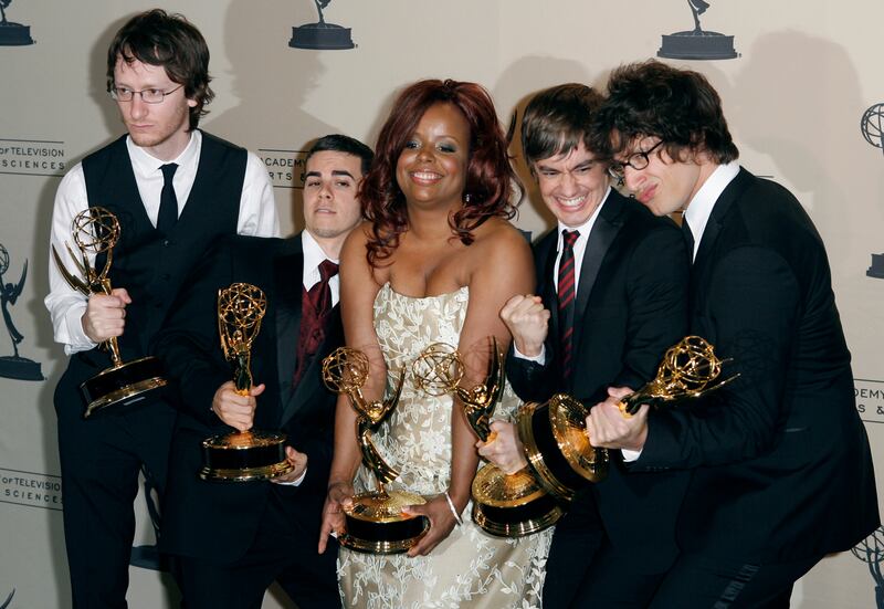 Saturday Night Live writers Akiva Schaffer, Asa Taccone, Katrice Sparks, Jorma Taccone and Andy Samberg celebrate their Emmy win for "Outstanding Original Music and Lyrics" for"'Dick in A Box" during the Primetime Creative Arts Emmy Awards