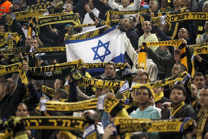 articles/2013/02/21/are-beitar-jerusalem-s-racist-fans-ruining-israeli-soccer/beitar-soccer-openz_f9knho
