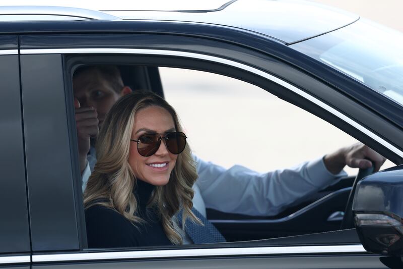 Lara and Eric Trump arrive at an airport in the U.S.
