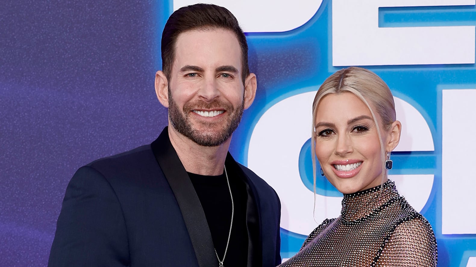 Tarek El Moussa and Heather Rae El Moussa attends the 2022 People's Choice Awards at Barker Hangar on December 06, 2022 in Santa Monica, California.