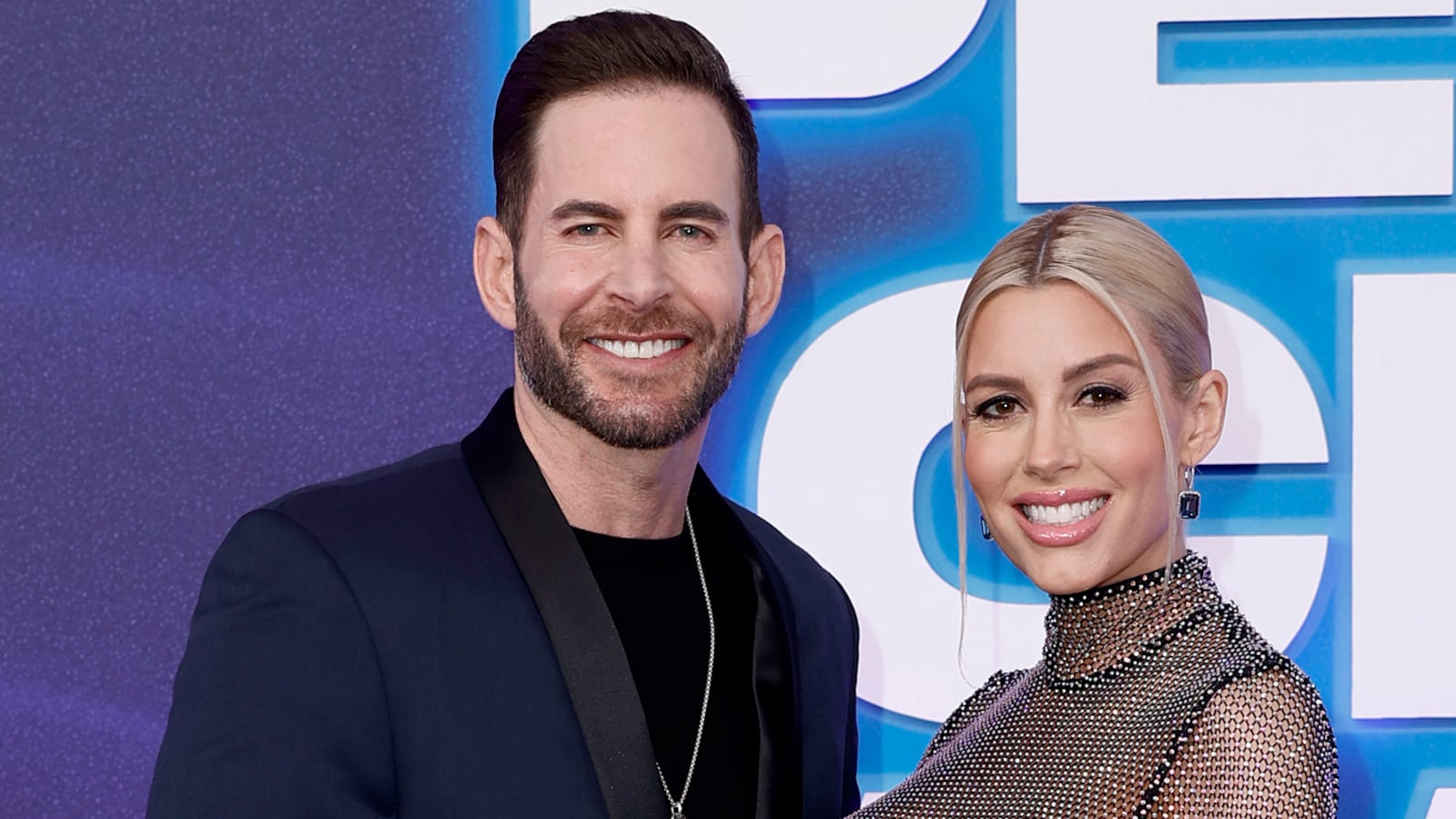 Tarek El Moussa and Heather Rae El Moussa attends the 2022 People's Choice Awards at Barker Hangar on December 06, 2022 in Santa Monica, California.