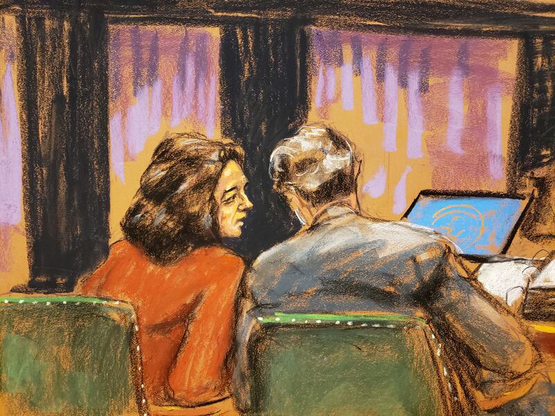 A courtroom sketch shows Ghislaine Maxwell speaking with defense attorney Jeffrey Pagliuca during her trial in New York City on December 8, 2021.