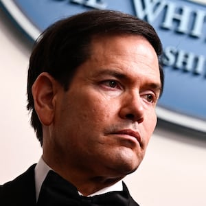 US Secretary of State Marco Rubio listens to US President Donald Trump speak during a press briefing in the Brady Briefing Room at the White House in Washington, DC, shortly after a shooting incident at the White House Correspondents' Dinner on April 25, 2026.