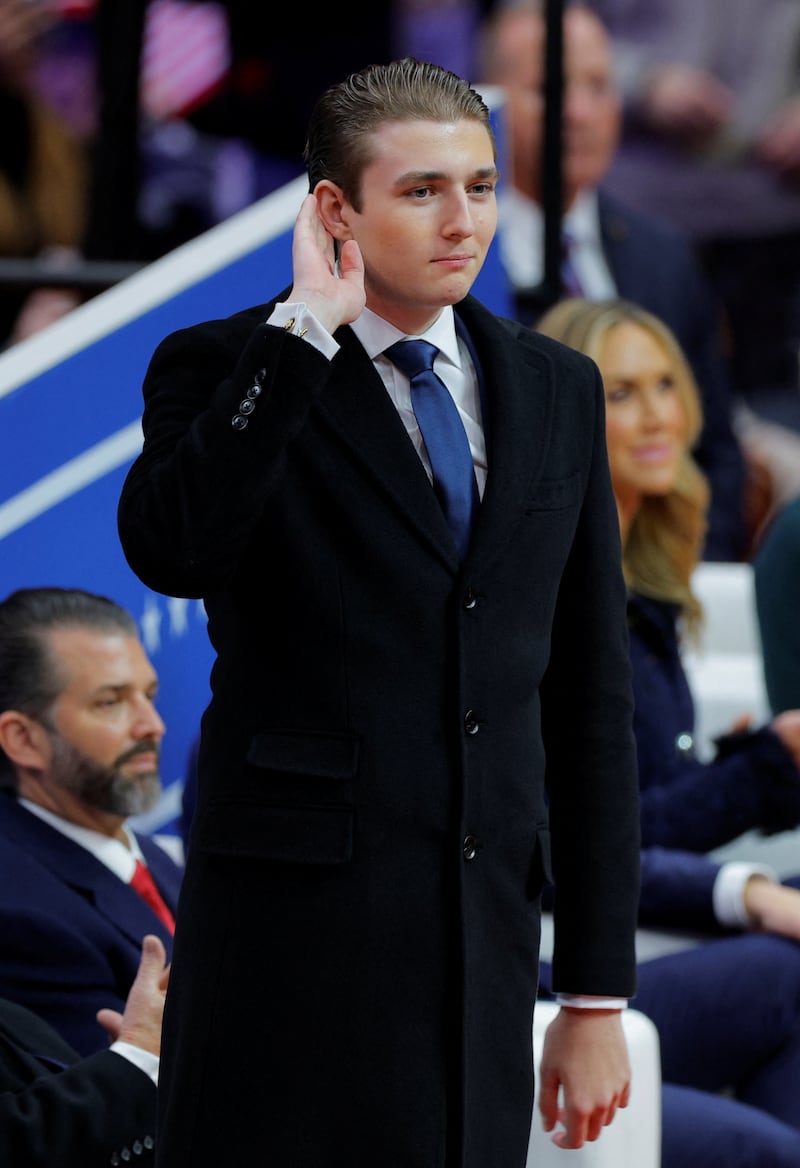 Barron Trump gestures at Capital One Arena on the inauguration day of Donald Trump's second presidential term, in Washington, U.S. January 20, 2025. REUTERS/Brian Snyder