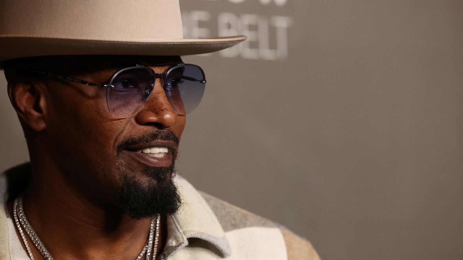 Jamie Foxx attends a movie premiere.