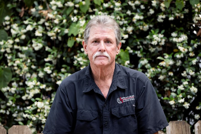 Steve Egan is an owner of a custom promotional items business, poses for a portrait during an interview with Reuters in Brandon, Florida, U.S. April 22, 2025. REUTERS/Marco Bello