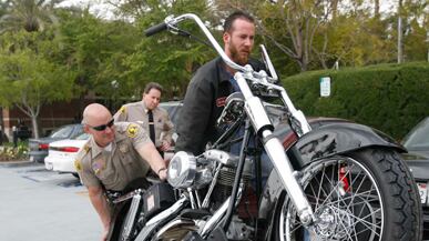 articles/2011/03/30/motorcycle-gang-sues-local-police-force/pelisek-vagos_170005_at2zq2