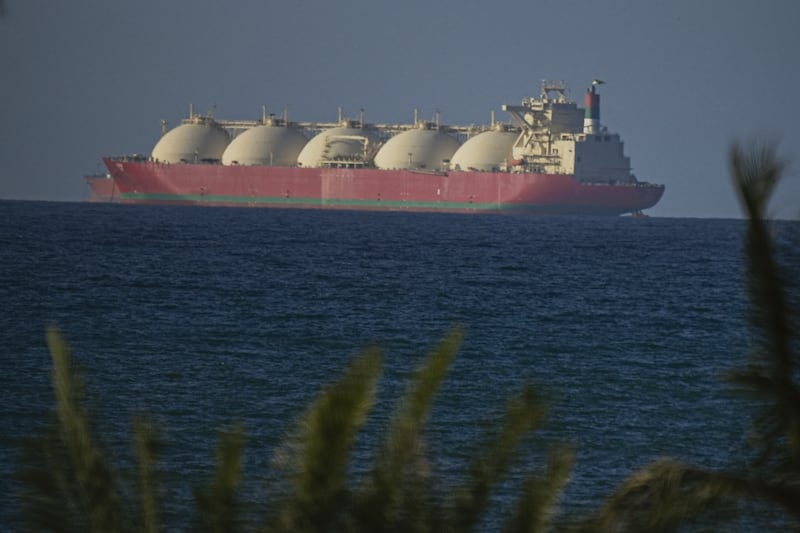A vessel passes through Strait of Hormuz following the two-week temporary ceasefire reached between the United States and Iran on the condition that the strait be reopened. Photo by Shady Alassar/Anadolu via Getty Images.