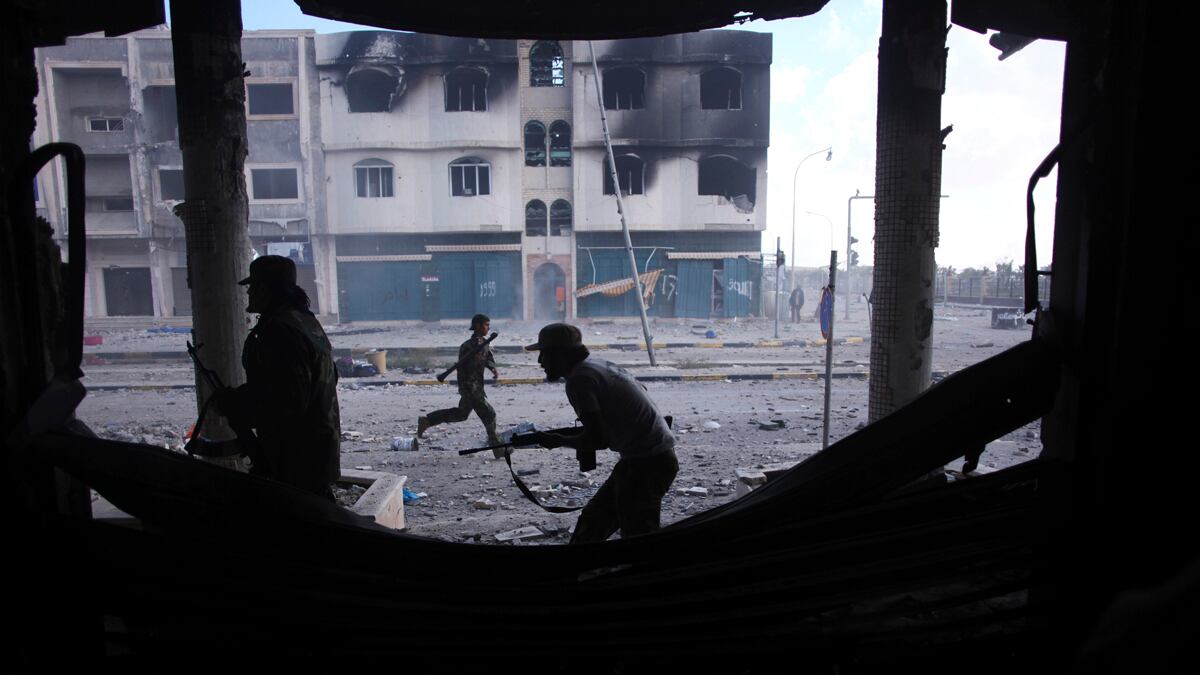 cheats/2011/10/20/sirte-falls-to-new-libyan-gov-t/libya-rebels-capture-sirte-cheat_kyxctl