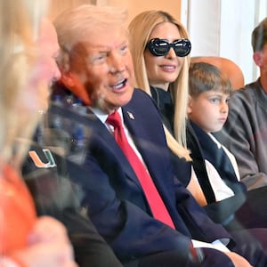 US President Donald Trump and his daughter Ivanka Trump attend the College Football National Championship Game between the Miami Hurricanes and the Indiana Hoosiers at Hard Rock Stadium in Miami Gardens, Florida, on January 19, 2026.