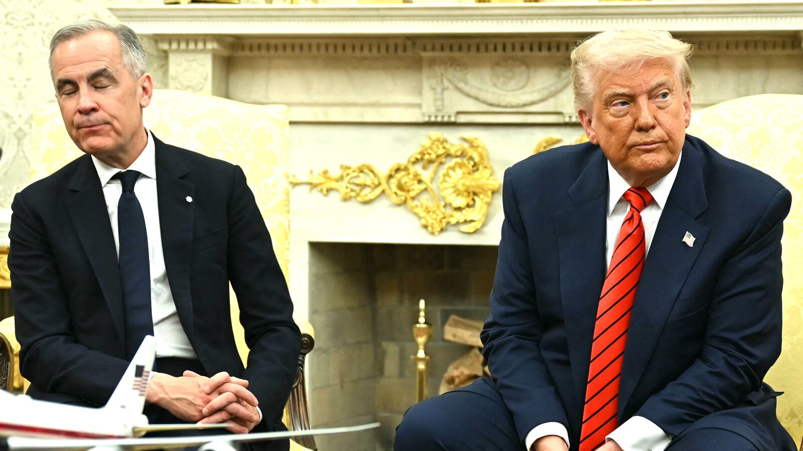 President Donald Trump with Canadian Prime Minister Mark Carney—Trump is threatening to impose a 35 percent tariff on Canadian imports.