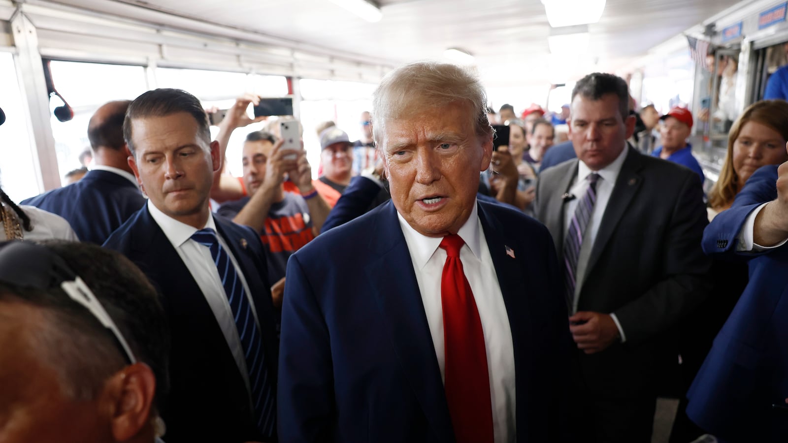 Former president Donald Trump greets supporters at Tony & Nick's Steaks, a sandwich shop in Philadelphia, on June 22, 2024.