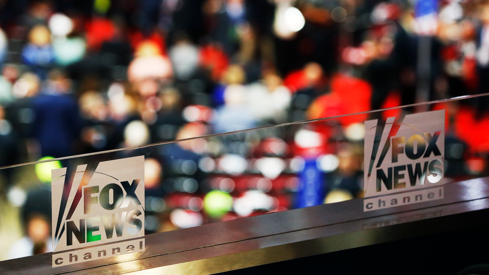 The Fox News logo on pieces of glass.