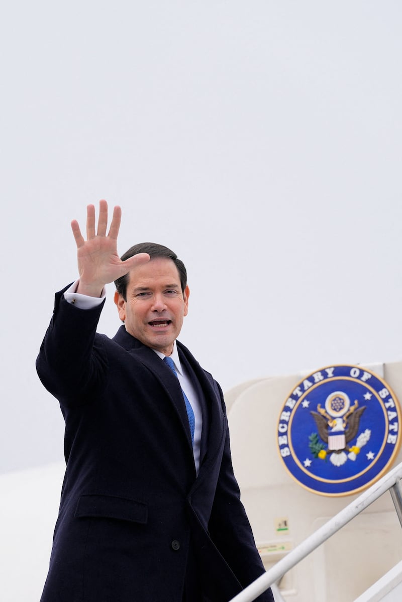 U.S. Secretary of State Marco Rubio waves as he departs at the Liszt Ferenc International Airport in Budapest, Hungary, February 16, 2026.     Alex Brandon/Pool via REUTERS