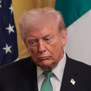 U.S. President Donald Trump attends a St. Patrick's Day reception, during Irish Taoiseach (Prime Minister) Micheal Martin's visit, in the East Room at the White House in Washington, D.C., U.S. March 17, 2026.
