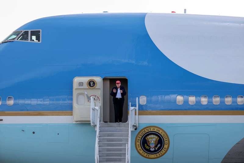 MIAMI, FLORIDA - FEBRUARY 19: U.S. President Donald Trump departs Air Force One at Miami International Airport on February 19, 2025 in Miami, Florida. President Trump is scheduled to attend a meeting of global financiers and tech executives hosted by Saudi Arabia’s sovereign wealth fund in Miami. (Photo by Joe Raedle/Getty Images)