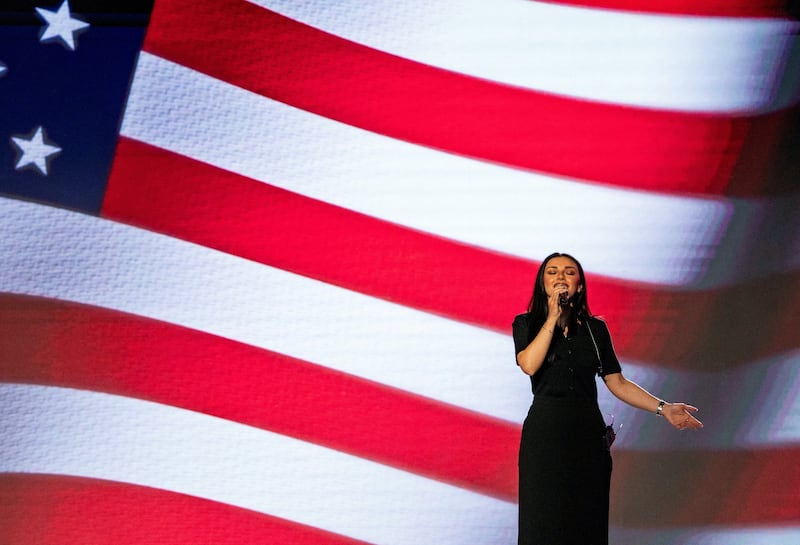 Country Music Artist Alexis Wilkins sings the National Anthem at the 2026 International Christian Media Convention held at the Gaylord Opryland Resort and Convention Center in Nashville, Tennessee, U.S., February 19, 2026.