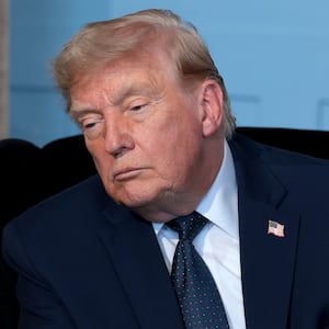 EVIAN-LES-BAINS, FRANCE - JUNE 15: U.S. President Donald Trump listens as he meets French President Emmanuel Macron for a bilateral meeting at Hotel Royal Evian on June 15, 2026 in Évian-les-Bains, France. Leaders from the Group of 7 (G7) countries convened in Evian, France, near the Swiss border, for their annual summit to discuss challenges to peace and security for Ukraine and Europe, the situation in the Middle East, and other geopolitical issues. (Photo by Anna Moneymaker/Getty Images)