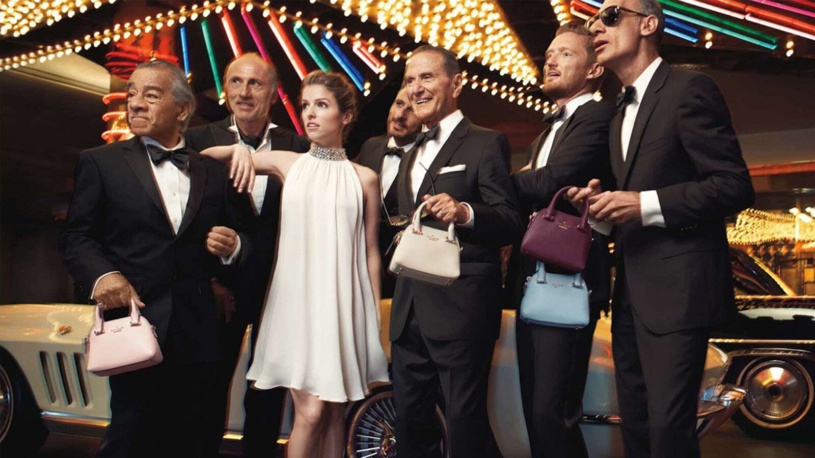 articles/2014/12/29/handbags-the-more-you-pay-the-smaller-they-shrink/141228-landers-mini-bag-tease_klx6j9